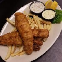 Fish & Chips · Our own hand beer-battered white fish lightly breaded and served with French fries, house ta...