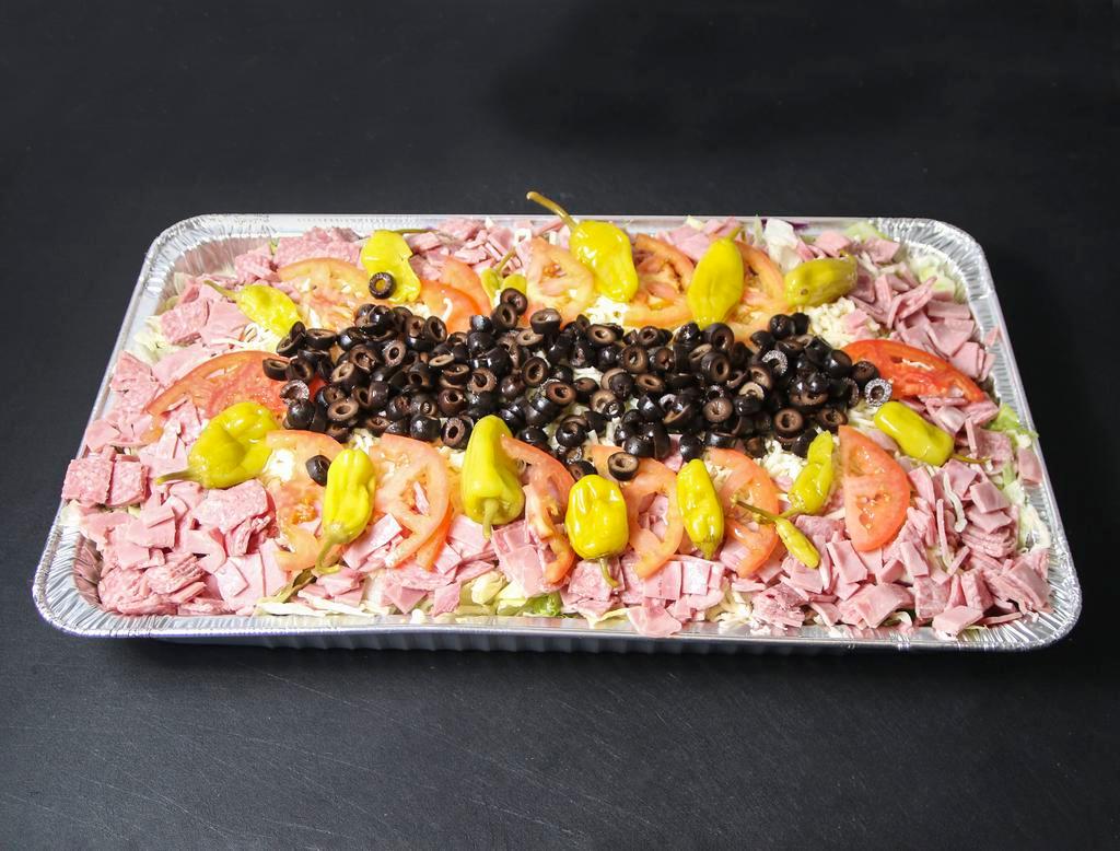 Antipasto Salad · Includes olives, pepperoncini, tomato, ham or salami and cheese.