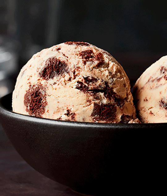 Irish Cream Brownie Ice Cream · Irish Cream infused into our ice cream with rich chocolate brownie pieces and a decadent fudge swirl. 

