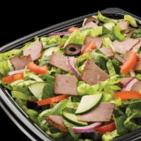 Roast Beef Chopped Salad · Piled high with thinly cut slices of lean roast beef. This crowd favorite is served with you...