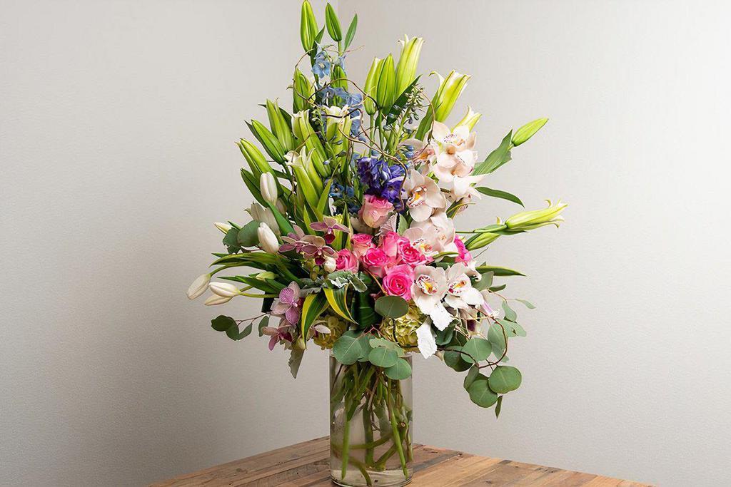 Deluxe Arrangement in a Vase · An extravagant luxurious arrangement of seasonal flowers.