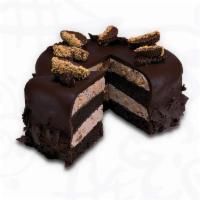 Peanut Butter Playground Cake · Layers of moist devil's food cake, peanut butter and chocolate ice cream with Reese’s peanut...