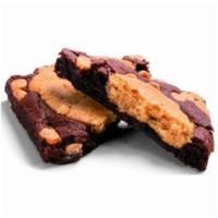 7-Eleven Peanut Butter Brookie with Reese's Peanut Butter Chips · Perfect blend of brownie and cookie mixed with Reese' Peanut butter chips.