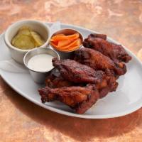 Chicken Wings · Jumbo smoked, crispy wings, Nashville hot sauce, pickled carrots, ranch dressing