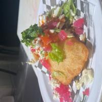 EMPANADAS · Lightly fried masa tortilla rolled into an empanada stuffed with your choice of meat. Topped...