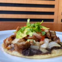 CARNITAS TACO · Refried black beans, onions, cabbage, avocado and tomato sauce. 