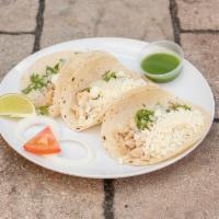 Taco de Pollo  · Order of 3 chicken tacos, grilled to perfection, topped with cheese, cilantro, and raw onion...