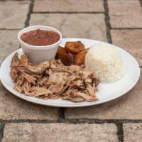 Carne de Puerco · Pulled Roast pork, slowly cooked in our special mojo sauce. Comes with white rice, garbanzo ...
