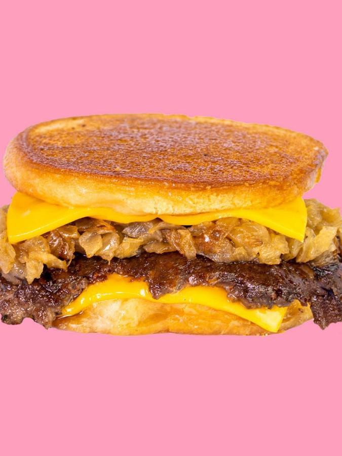 Karl's Deluxe · A patty melt served Karl’s Style with a crispy seasoned beef patty, caramelized onion & cheese in a toasty inverted bun.