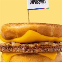 Impossible™️ Karl’s Deluxe · A patty melt served Karl’s Style with a crispy seasoned Impossible™ patty, caramelized onion...