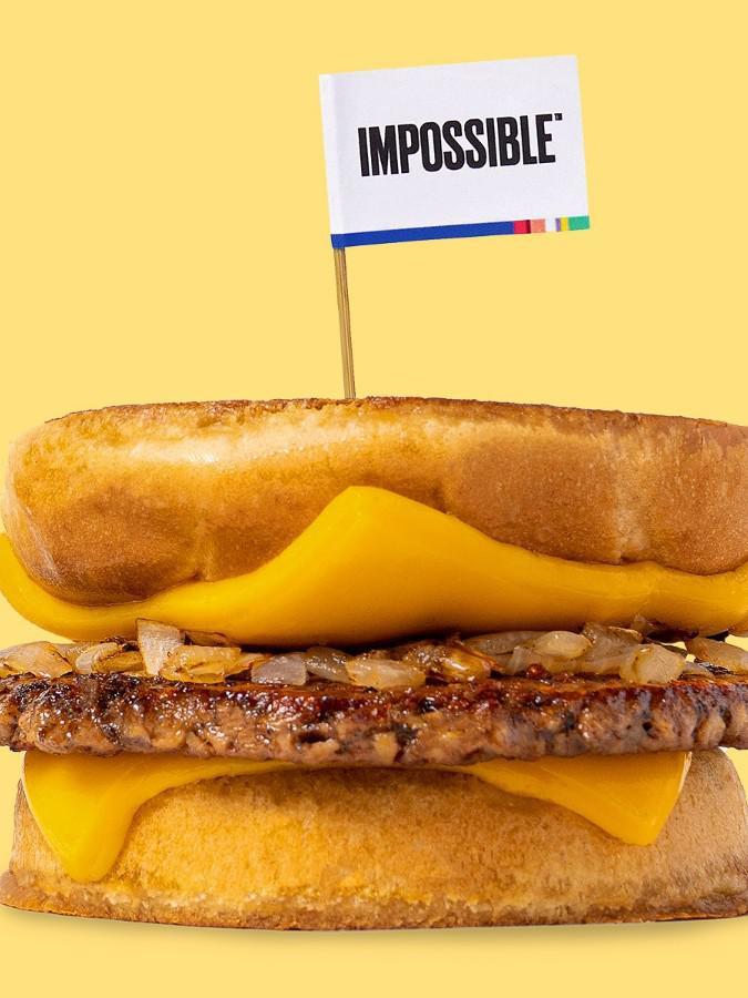 Impossible™️ Karl’s Deluxe · A patty melt served Karl’s Style with a crispy seasoned Impossible™ patty, caramelized onions and cheese on a toasty inverted bun.