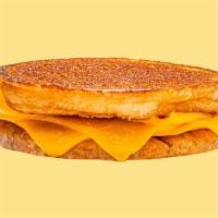 Karl’s Grilled Cheese  · 3 slices of American cheese griddled crisp on an inverted bun.