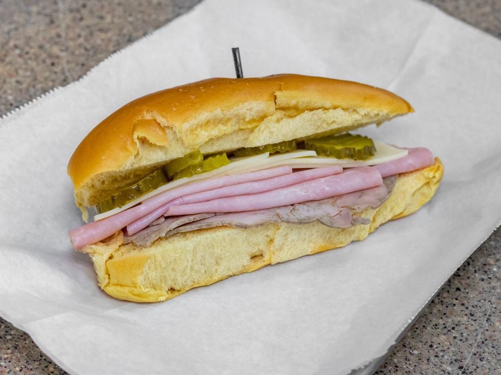 Media Noche Sandwich · Local favorite, Cuban sandwich on sweet bread.