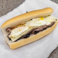 Bistec a Caballo · Roasted beef steak, fried eggs ,cheese, potato stick in a Cuban bread 