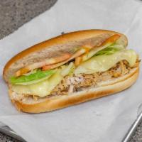 Pulled Chicken Sandwich · Fresh chicken cooked with herbs and exotic spices and pulled before serving.