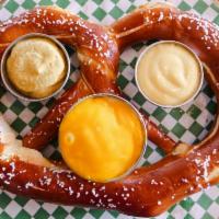 Bavarian Zal · Large 14 inch Pretzel, Buttered and salted with sides of Cheese Sauce, Dijon mustard and hon...