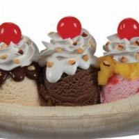Banana Split Sundae · Delight in a traditional treat with three of your favorite ice cream flavors, two banana sli...
