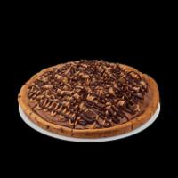 Peanut Butter and Chocolate and Reese's Peanut Butter Cup Polar Pizza · An ice cream treat you eat like pizza! A chocolate chip cookie crust with peanut butter and ...