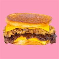 Karl's Deluxe · A patty melt served Karl’s Style with a crispy seasoned beef patty, caramelized onions & che...