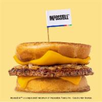 Impossible™ Karl's Deluxe · A patty melt served Karl’s Style with a crispy seasoned Impossible™ patty, caramelized onion...