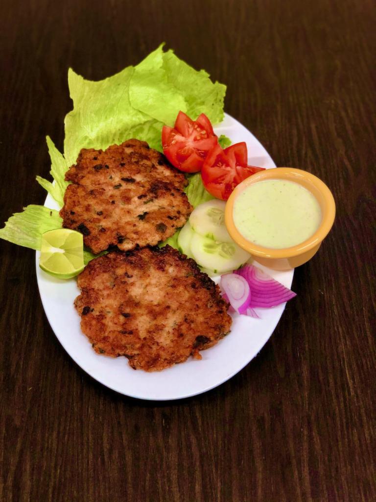 4Pc Beef Chapli Kabab  · Chapli kebab is widely popular in Pakistan. Mixed with South Asian blend of spices, the Meat is flattened into circles and shallow-fried. The patty have a charred exterior for an authentic look and flavor! Served with Mint Sauce.
45 MINUTES COOKING TIME