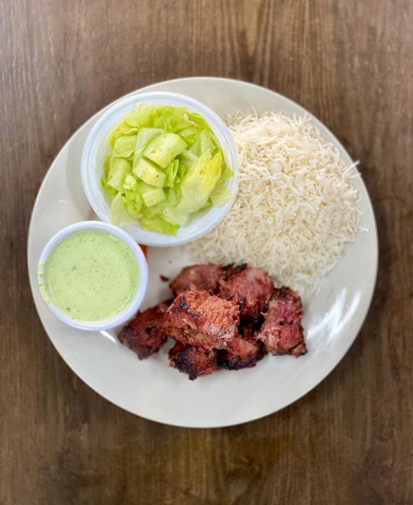10. Beef Boti Kabab Platter · Cubes of beef marinated with the regular spices, yogurt, papaya paste and ginger garlic paste. Served with Side of Mint Sauce, Salad and Choice of Rice or Naan Bread.
