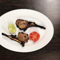 3 Piece Lamb Chops Kabab · Lamb chops baked using skewers in Tandoor Oven, marinated in yogurt, onion, spices and sauce...
