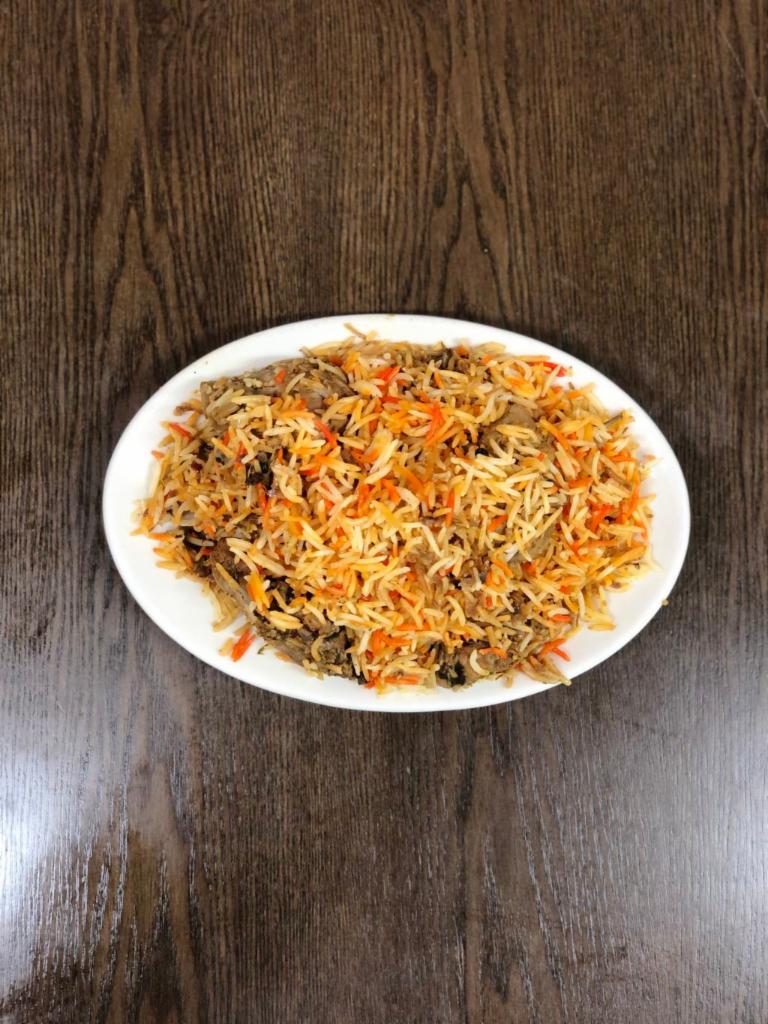Bone-in Chicken Biryani · Biryani is one of the most amazing Royal Delicacies, Made by Layering g marinated chicken, parboiled premium Pakistani basmati rice and spices.