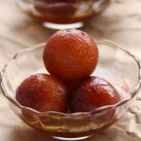 1 lb. Gulab Jamon · Fried dough balls that are soaked in a sweet, sticky Rose Flavor Sugar syrup.

