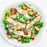 Gluten-Free Chicken Caesar Salad · Crisp romaine, sliced chicken breast, freshly grated Parmesan (no croutons). Served with Cae...