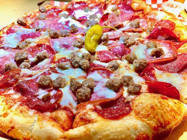 Meat Lovers Pizza  · Beef pepperoni, beef sausage, beef salami and canadian bacon. 