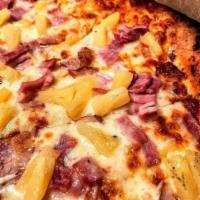 Hawaiian Pizza  · Marinara, mozzarella, turkey ham and pineapple. 