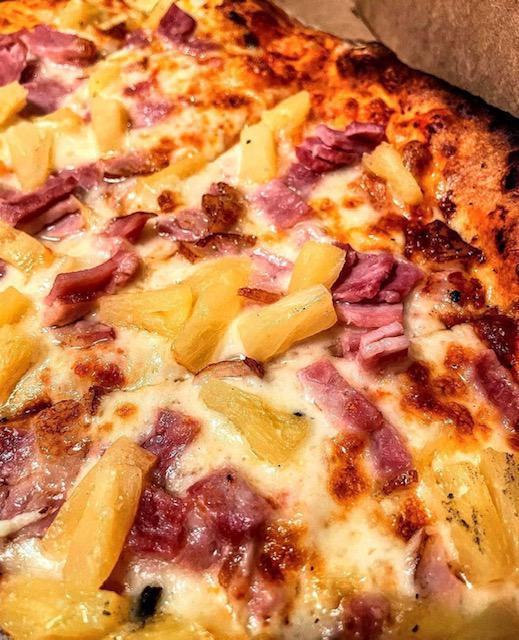 Hawaiian Pizza  · Marinara, mozzarella, turkey ham and pineapple. 