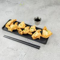 7 Pieces Crab Rangoon · Fried wonton wrapper filled with crab and cream cheese.