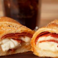Godfather'sPepperoni Pizza Roll · Godfather's Pizza roll stuffed with pepperoni and cheese.  Served with marinara sauce.