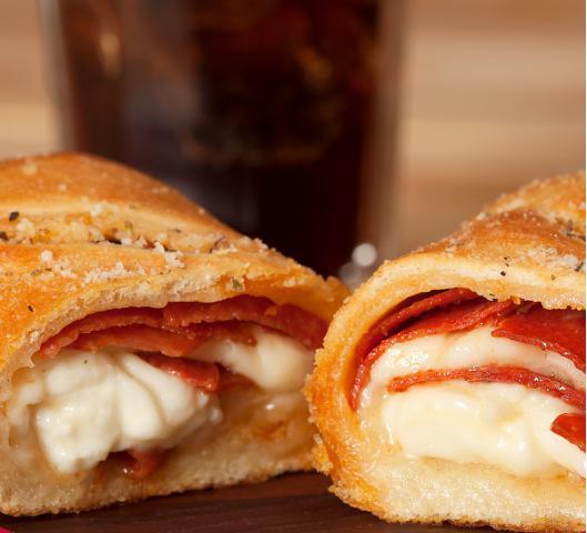 Godfather'sPepperoni Pizza Roll · Godfather's Pizza roll stuffed with pepperoni and cheese.  Served with marinara sauce.