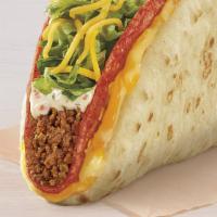 Doritos® Cheesy Gordita Crunch - Flamin' Hot® Cool Ranch® · A Flamin’ Hot® Cool Ranch® Doritos® Locos Tacos shell filled with seasoned beef, spicy ranch...