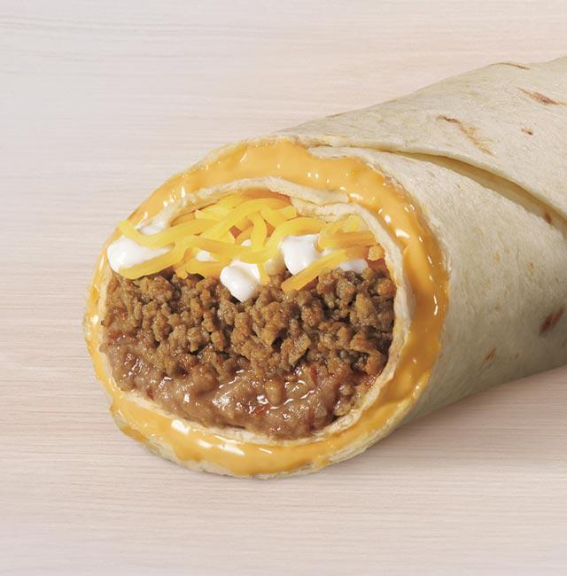 Beefy 5-Layer Burrito · A warm tortilla is covered in a layer of warm nacho cheese and topped with seasoned beef, refried beans, cool sour cream and shredded cheddar cheese. Then it's wrapped creating a layer of nacho cheese all around the outside of the burrito.