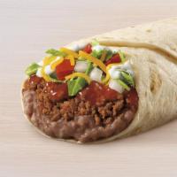Burrito Supreme® · A warm flour tortilla loaded with seasoned beef, refried beans, tomatoes, onions, iceberg le...
