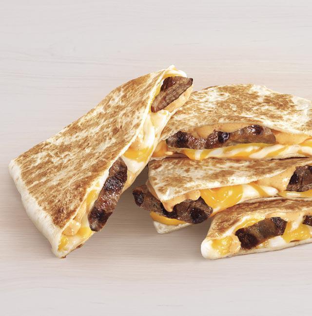 Steak Quesadilla · A warm flour tortilla filled with USDA Select Marinated Grilled Steak, Three Cheese Blend, Creamy Jalapeno Sauce, folded over and grilled.