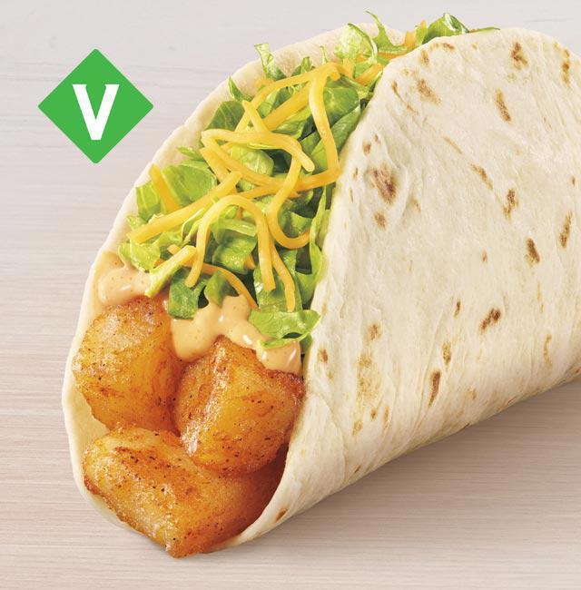 Spicy Potato Soft Taco · A flour tortilla filled with crispy potato bites, lettuce, real shredded cheddar cheese, and creamy chipotle sauce.