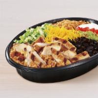 Power Menu Bowl · Seasoned rice and black beans topped with grilled chicken, avocado ranch sauce, reduced-fat ...