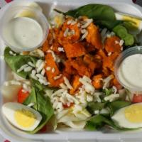 Buffalo Chicken Salad · Fresh mix of greens, boiled eggs, flavorful buffalo chicken. Healthy & Delicious. 