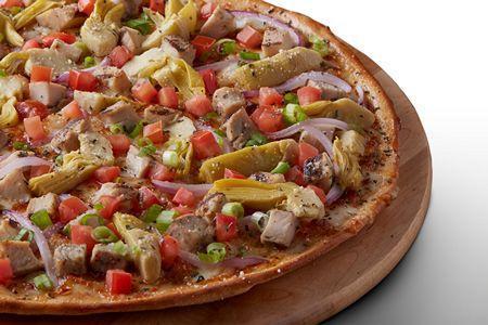 Tuscan Garlic Chicken Pizza · Signature Garlic White Sauce on our Tuscany Thin Crust, topped with Mozzarella and Parmesan Cheeses, All-Natural Grilled Chicken, Red Onions, Green Onions, Fresh Roma Tomatoes, Marinated Artichoke Hearts, and Dried Basil.