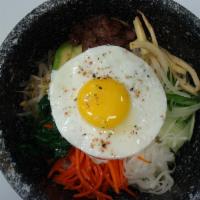 Dolsot Bibimbab · Assorted vegetable/egg over rice with beef, chicken, or tofu.