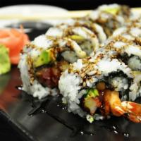 Wolverine Roll · Eel, avocado, tuna, shrimp tempura, crabmeat with eel sauce.