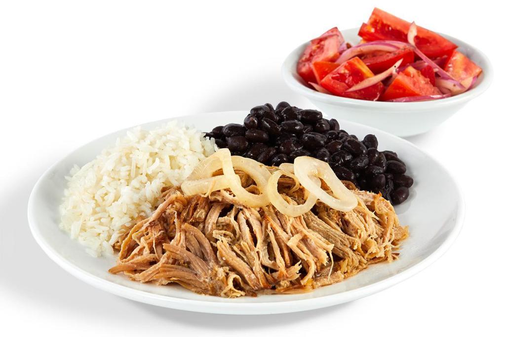 Mojo Roast Pork Platter · Roasted in our own special Caribbean mojo juice blend, this tropical pork is a moist and tender sensation topped with sauteed onions.