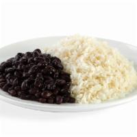 White Rice & Black Beans · Fluffy long grain white rice with authentic and flavorful black beans.