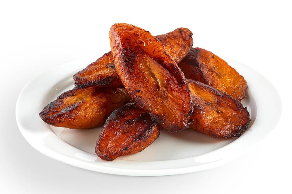 Sweet Plantains · Perfectly ripe, sweet plantains, cooked to a golden caramelized finish.