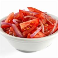 Balsamic Tomatoes · Vine-ripened Roma tomatoes and red onions in a balsamic vinaigrette dressing.
